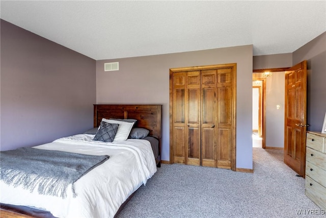 5477 Pebble Beach Dr, Hamburg, NY 14075 - bedroom featuring a closet and light carpet