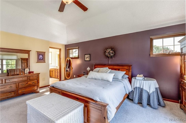 5477 Pebble Beach Dr, Hamburg, NY 14075 - bedroom with carpet flooring, connected bathroom, and a ceiling fan