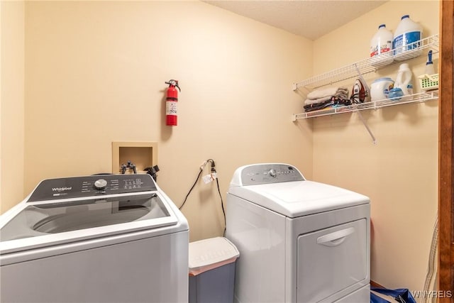 5477 Pebble Beach Dr, Hamburg, NY 14075 - washroom featuring washer and dryer