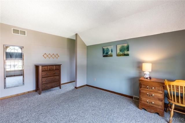 5477 Pebble Beach Dr, Hamburg, NY 14075 - bedroom featuring vaulted ceiling, carpet, a textured ceiling, and a desk