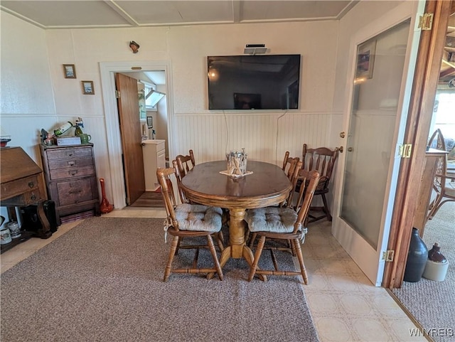 10337 Chaffee Ln, Yates, NY 14098 - dining space featuring wainscoting and light flooring