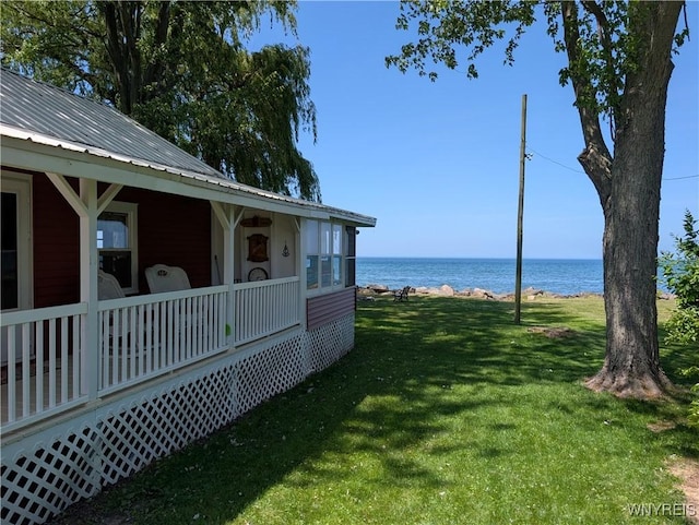10337 Chaffee Ln, Yates, NY 14098 - view of grassy yard with a water view and a porch