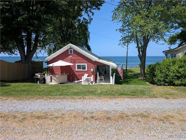 10337 Chaffee Ln, Yates, NY 14098 - view of side of property featuring a water view and a patio area