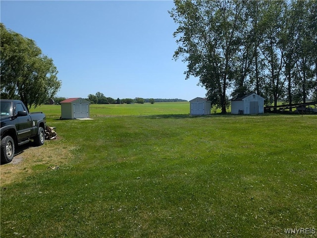 10337 Chaffee Ln, Yates, NY 14098 - view of grassy yard with a storage unit