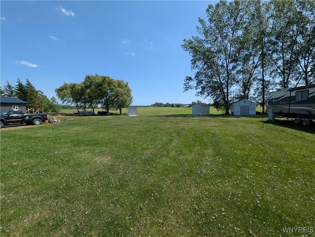 10337 Chaffee Ln, Yates, NY 14098 - view of grassy yard with a storage unit