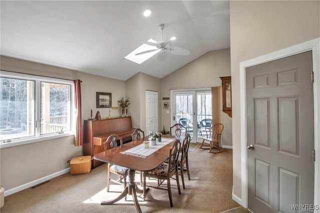 8515 Rte 243, Rushford, NY 14777 - dining space featuring carpet flooring, ceiling fan, lofted ceiling, and a skylight