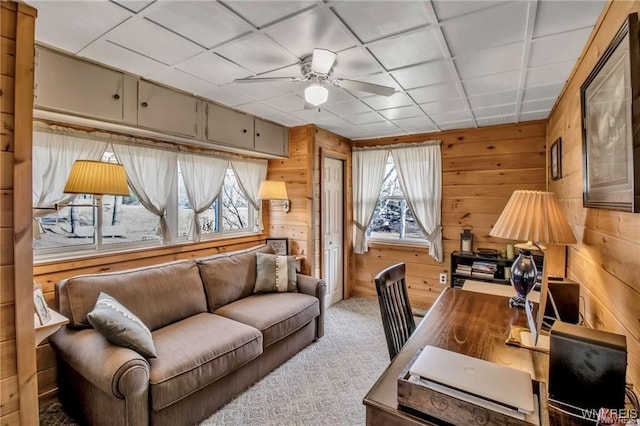 8515 Rte 243, Rushford, NY 14777 - home office featuring ceiling fan, wood walls, and carpet flooring