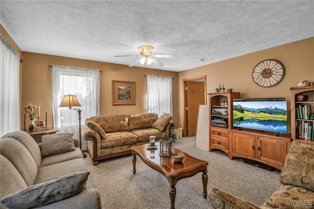 8515 Rte 243, Rushford, NY 14777 - carpeted living room featuring ceiling fan and a textured ceiling