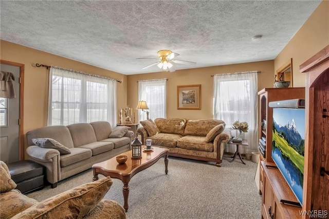 8515 Rte 243, Rushford, NY 14777 - carpeted living room featuring a textured ceiling and ceiling fan