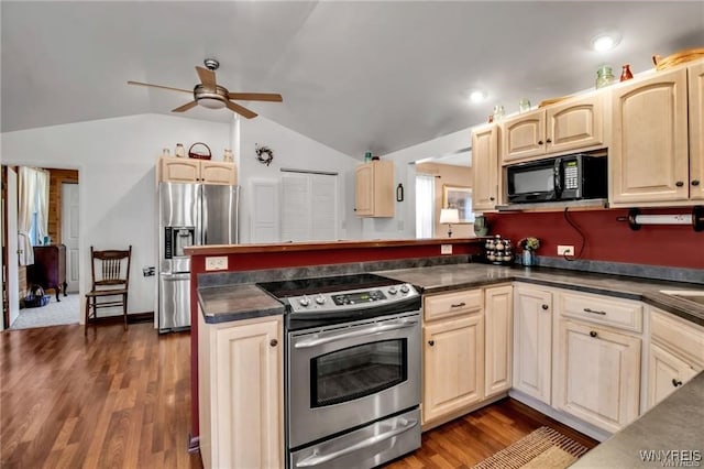 8515 Rte 243, Rushford, NY 14777 - kitchen with stainless steel appliances, lofted ceiling, ceiling fan, dark countertops, and dark wood finished floors