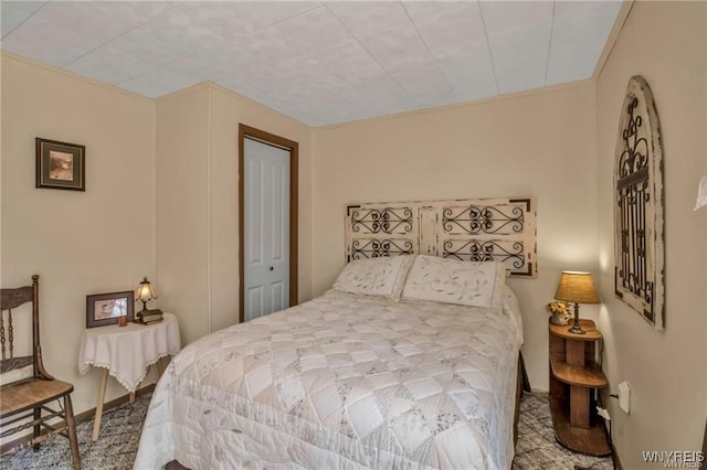 8515 Rte 243, Rushford, NY 14777 - carpeted bedroom with a closet and baseboards