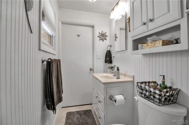 8515 Rte 243, Rushford, NY 14777 - bathroom featuring vanity, ornamental molding, and tile patterned flooring