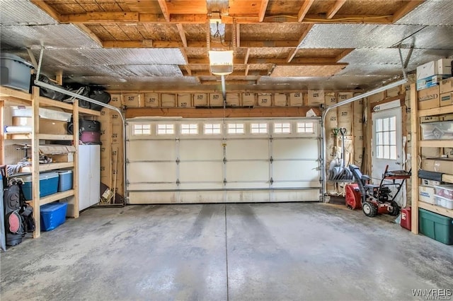 8515 Rte 243, Rushford, NY 14777 - garage featuring a garage door opener