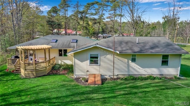 8515 Rte 243, Rushford, NY 14777 - back of property featuring a wooden deck, a yard, roof with shingles, and view of wooded area
