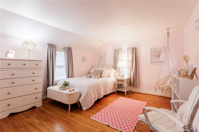 80 Rock Beach Rd, Irondequoit, NY 14617 - bedroom featuring lofted ceiling and light wood-style floors