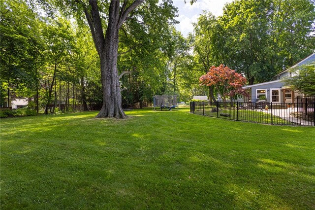 80 Rock Beach Rd, Irondequoit, NY 14617 - view of yard featuring a trampoline