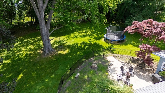 80 Rock Beach Rd, Irondequoit, NY 14617 - view of yard featuring a trampoline and a patio