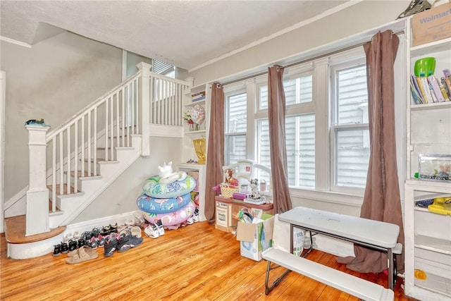 65-67 Woodlawn St, Rochester, NY 14607 - recreation room with wood finished floors and crown molding