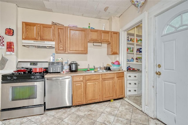 65-67 Woodlawn St, Rochester, NY 14607 - kitchen featuring stainless steel appliances, under cabinet range hood, and light countertops