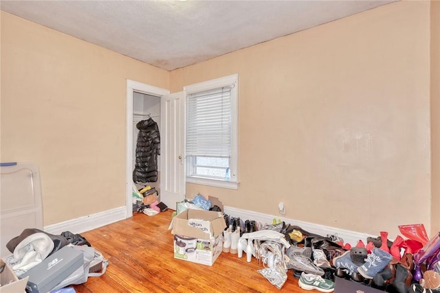 65-67 Woodlawn St, Rochester, NY 14607 - unfurnished bedroom featuring wood finished floors and baseboards