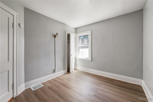 717 Lasalle Ave, Buffalo, NY 14215 - spare room featuring wood finished floors and baseboards