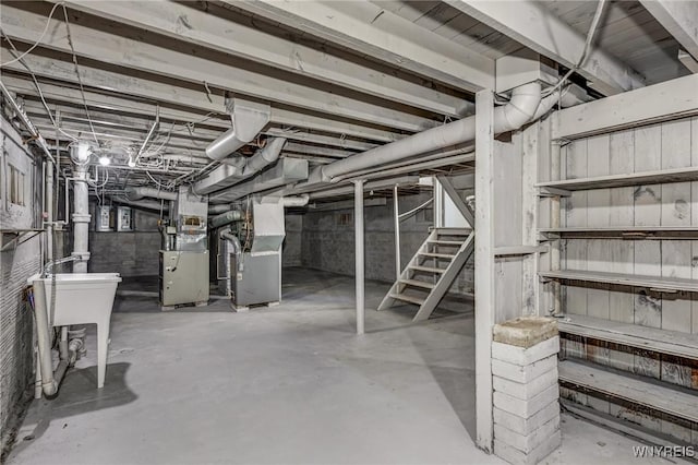 717 Lasalle Ave, Buffalo, NY 14215 - unfinished basement with stairs and heating unit