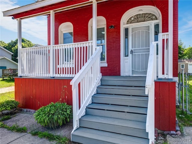 152 Mulberry St, Buffalo, NY 14204 - entrance to property featuring covered porch and brick siding