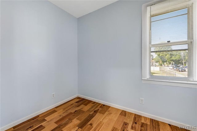 152 Mulberry St, Buffalo, NY 14204 - unfurnished room with baseboards and wood finished floors