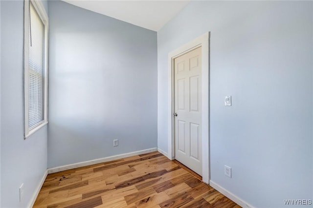 152 Mulberry St, Buffalo, NY 14204 - spare room featuring wood finished floors and baseboards