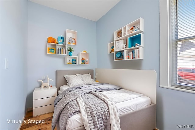 152 Mulberry St, Buffalo, NY 14204 - bedroom featuring wood finished floors and baseboards