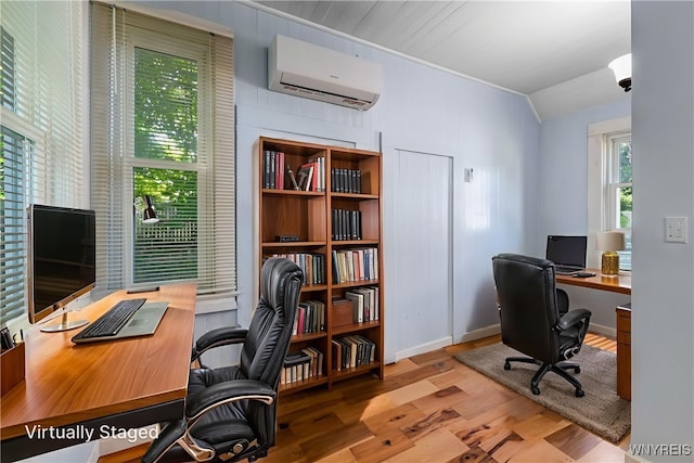 152 Mulberry St, Buffalo, NY 14204 - office featuring an AC wall unit, wood finished floors, and vaulted ceiling