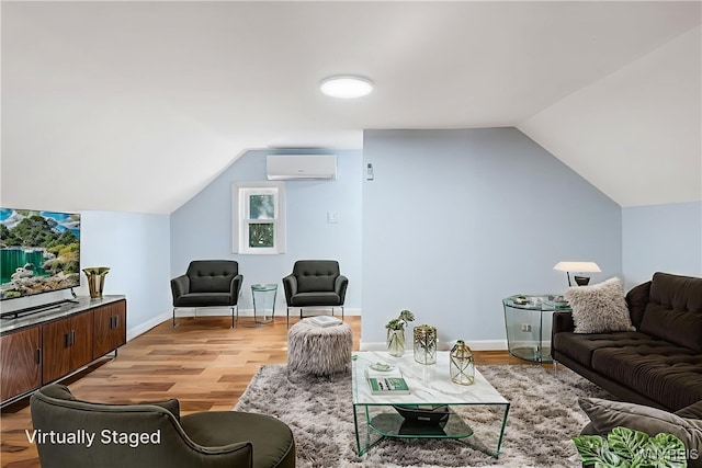 152 Mulberry St, Buffalo, NY 14204 - living room featuring an AC wall unit, lofted ceiling, and light wood-style floors