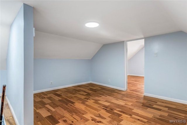 152 Mulberry St, Buffalo, NY 14204 - additional living space with lofted ceiling and wood finished floors