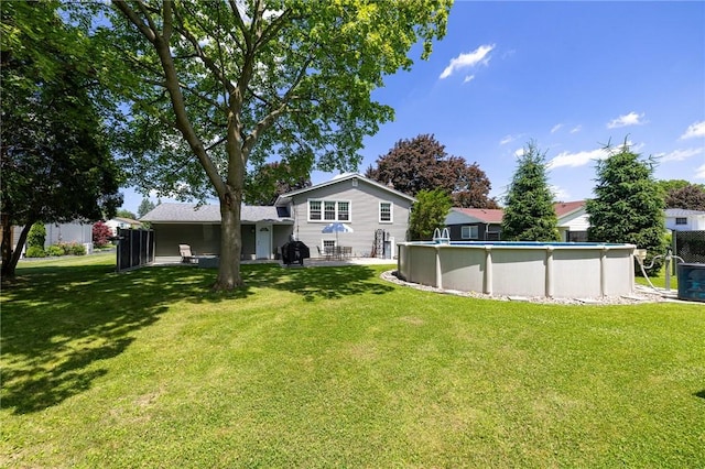 97 Saint Andrews Dr, Greece, NY 14626 - view of grassy yard with an outdoor pool