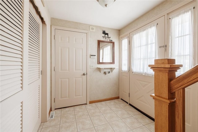 97 Saint Andrews Dr, Greece, NY 14626 - doorway to outside with light tile patterned floors
