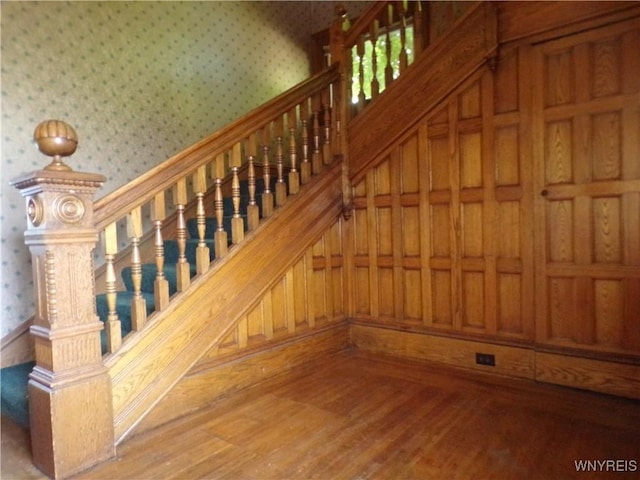 315 Laurens St, Olean-City, NY 14760 - staircase featuring wallpapered walls and wood finished floors