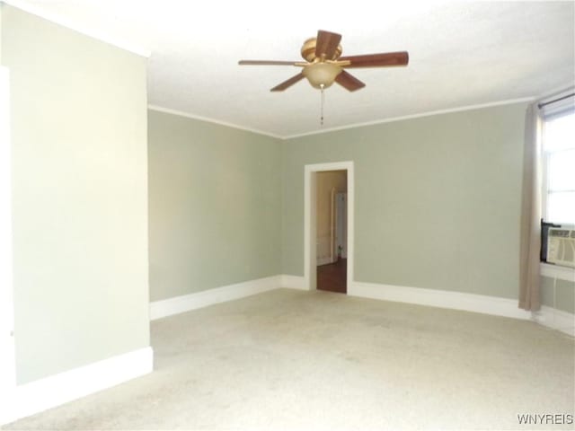 315 Laurens St, Olean-City, NY 14760 - carpeted spare room with ceiling fan, crown molding, and cooling unit