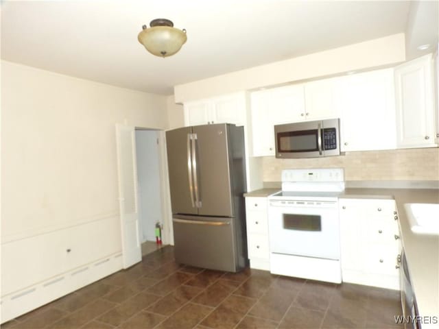 315 Laurens St, Olean-City, NY 14760 - kitchen featuring appliances with stainless steel finishes, a baseboard heating unit, white cabinets, backsplash, and light countertops