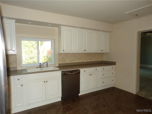 315 Laurens St, Olean-City, NY 14760 - kitchen with dishwashing machine, decorative backsplash, and white cabinets
