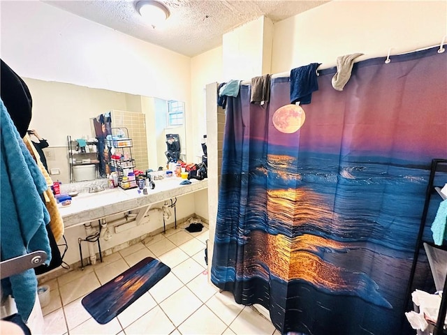 26 Kohlman St, Rochester, NY 14621 - bathroom featuring a textured ceiling and tile patterned flooring