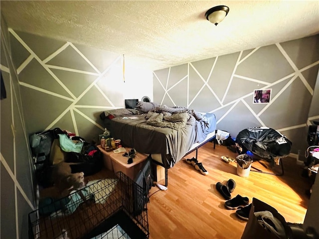 26 Kohlman St, Rochester, NY 14621 - bedroom featuring a textured ceiling and wood finished floors