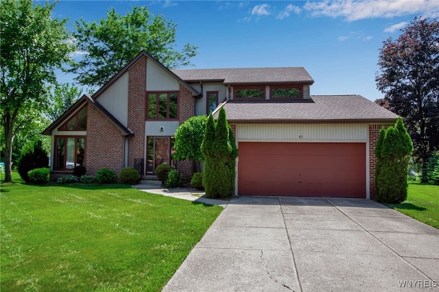 83 Randwood Dr, Amherst, NY 14068 - view of front of home with a front lawn, concrete driveway, brick siding, and a garage