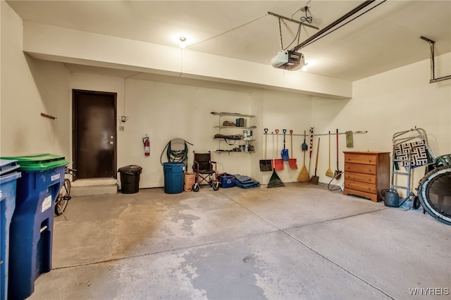 83 Randwood Dr, Amherst, NY 14068 - garage featuring a garage door opener