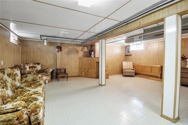 742 93rd St, Niagara Falls, NY 14304 - below grade area featuring tile patterned floors and wooden walls