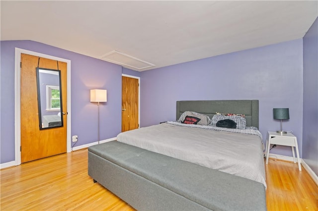 917 Whalen Rd, Penfield, NY 14526 - bedroom with wood finished floors and attic access