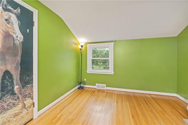 917 Whalen Rd, Penfield, NY 14526 - unfurnished room with wood finished floors and baseboards