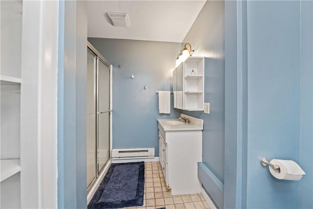 917 Whalen Rd, Penfield, NY 14526 - full bath with a baseboard radiator, a shower stall, and vanity