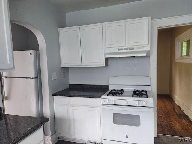 609 W Colvin St, Syracuse, NY 13205 - kitchen with white appliances, under cabinet range hood, white cabinets, and dark wood-type flooring