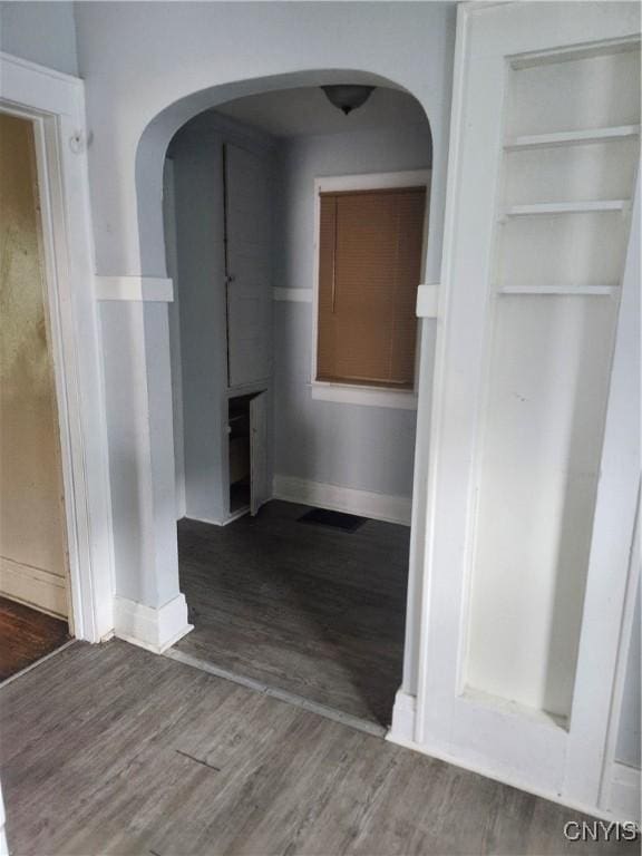 609 W Colvin St, Syracuse, NY 13205 - hallway featuring wood finished floors and arched walkways