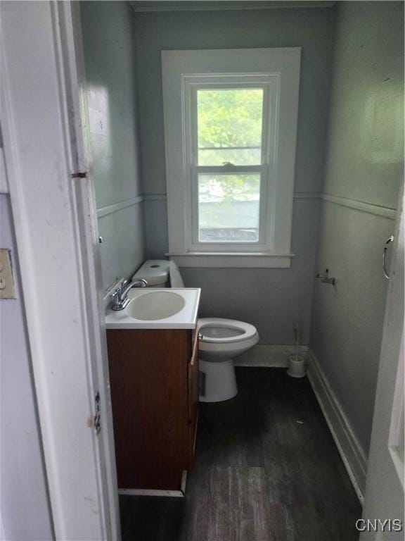 609 W Colvin St, Syracuse, NY 13205 - half bath featuring vanity and wood finished floors